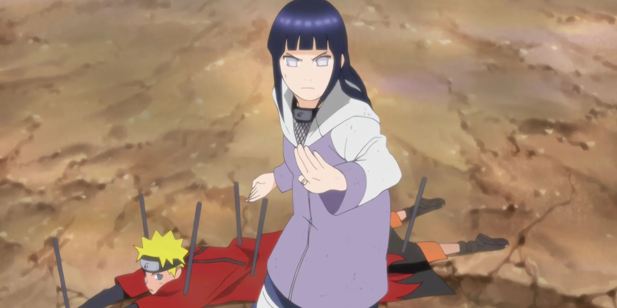 Hinata Hyuga đứng chắn trước Pain để bảo vệ Naruto, cảnh biểu tượng cho tình yêu đơn phương và lòng dũng cảm của cô trong series Naruto.