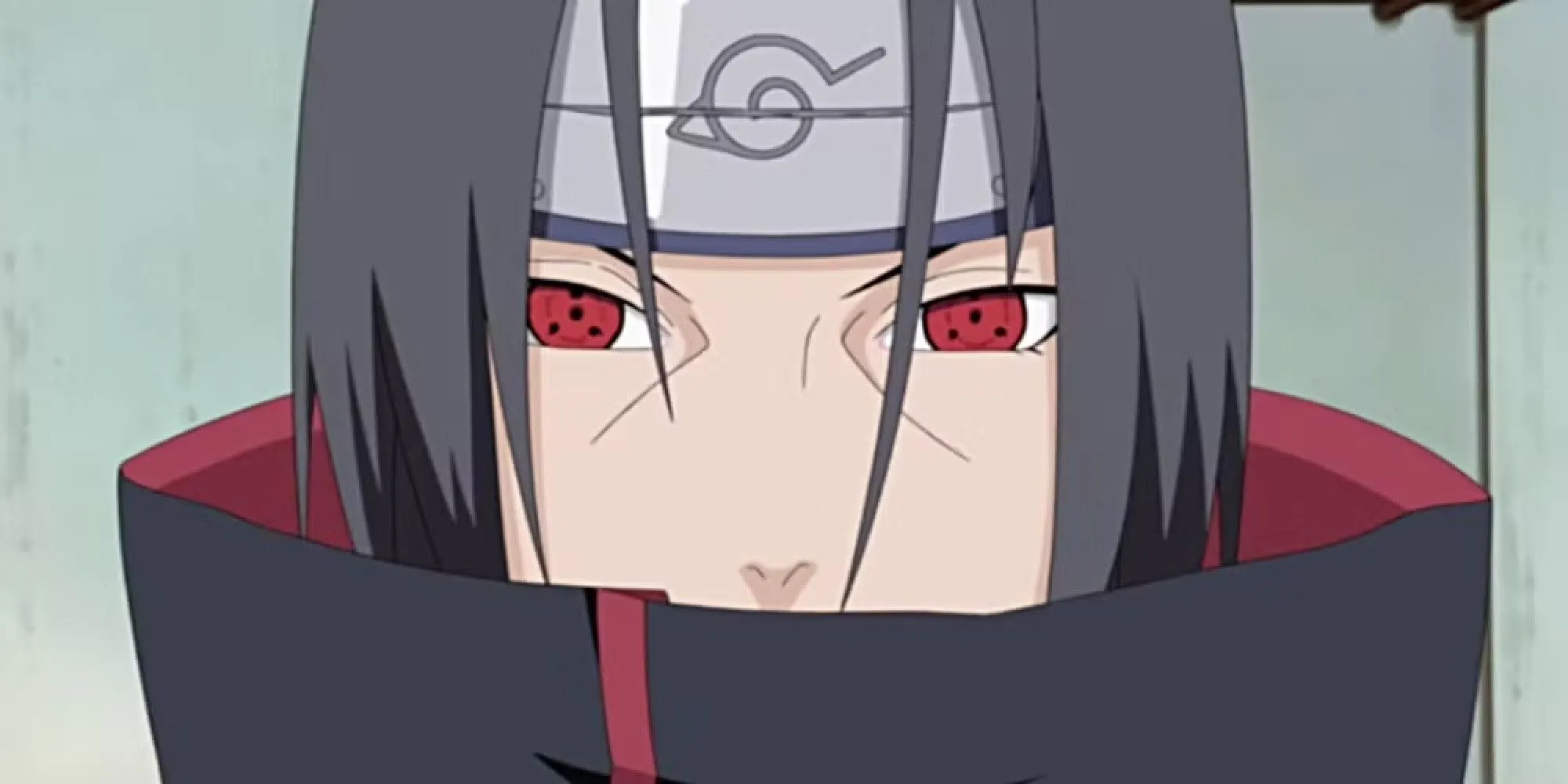 Itachi Uchiha trong trang phục Akatsuki, đôi mắt Sharingan đầy bí ẩn