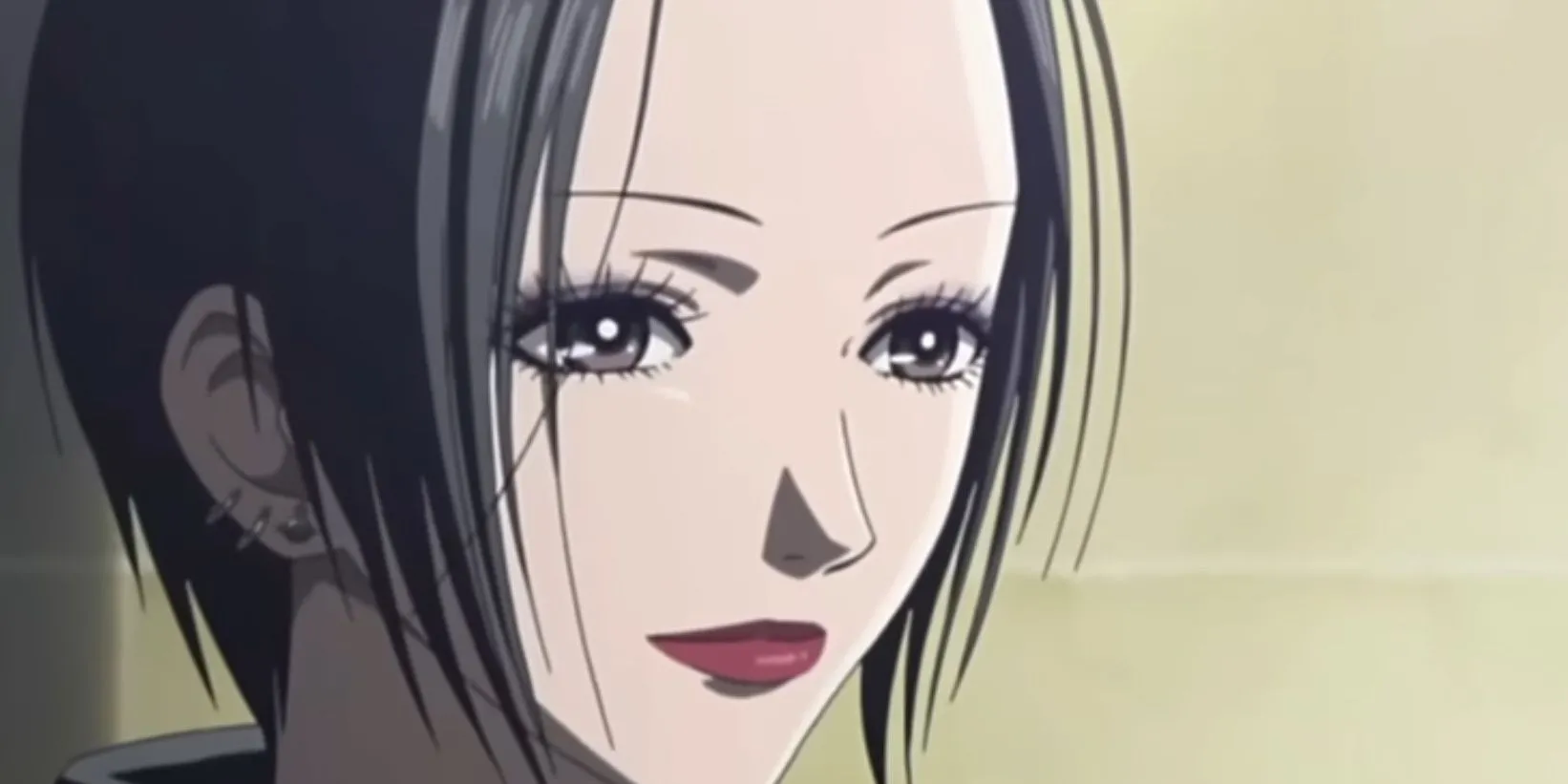 Nana Osaki trong anime Nana, hình ảnh thể hiện phong cách âm nhạc và sự đấu tranh cảm xúc trong mối quan hệ với Ren, minh họa cho bài học buông bỏ khi tình yêu không đủ