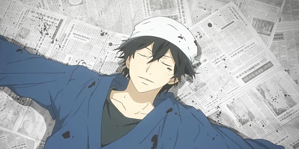 Seishuu Handa nằm trên báo phủ đầy mực, thể hiện sự bế tắc và suy tư trong Barakamon