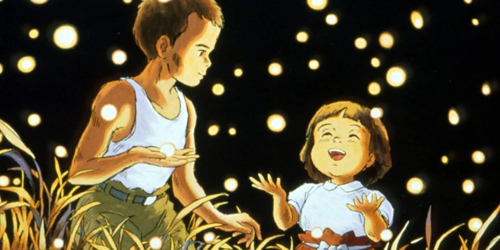 Seita và Setsuko ngồi bên cạnh những con đom đóm trong đêm trong phim Mộ đom đóm, biểu tượng của hy vọng mong manh