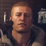 BJ Blazkowicz trong Wolfenstein: The New Order khi đang bị hai nòng súng chĩa vào đầu.