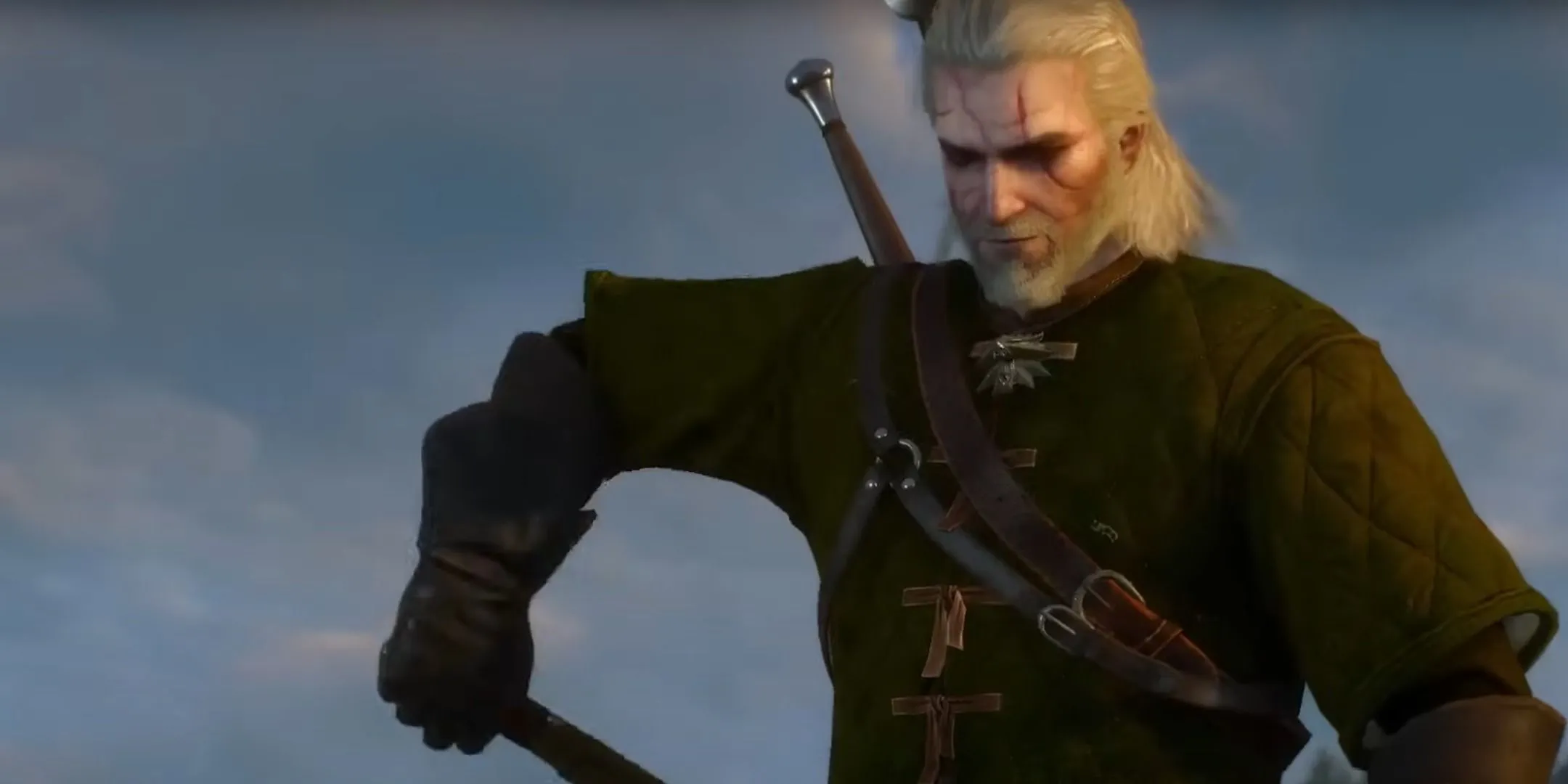 Geralt cầm đầu Griffin sau khi tiêu diệt quái vật trong The Witcher 3 Wild Hunt