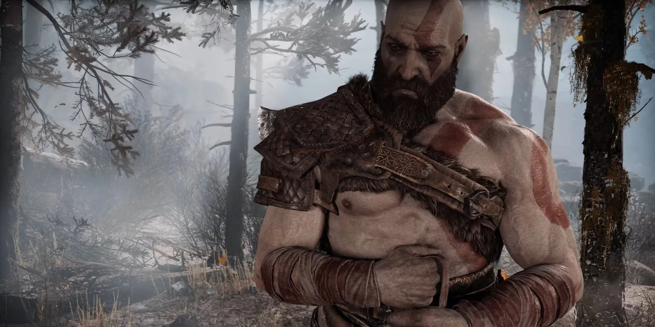 Kratos với vẻ ngoài từng trải, đầy suy tư trong God of War (2018).