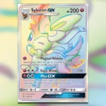 Thẻ Sylveon GX Secret Rare từ bộ Guardians Rising trong Pokemon TCG, thể hiện sự lấp lánh và độc đáo của thẻ bài hiếm.