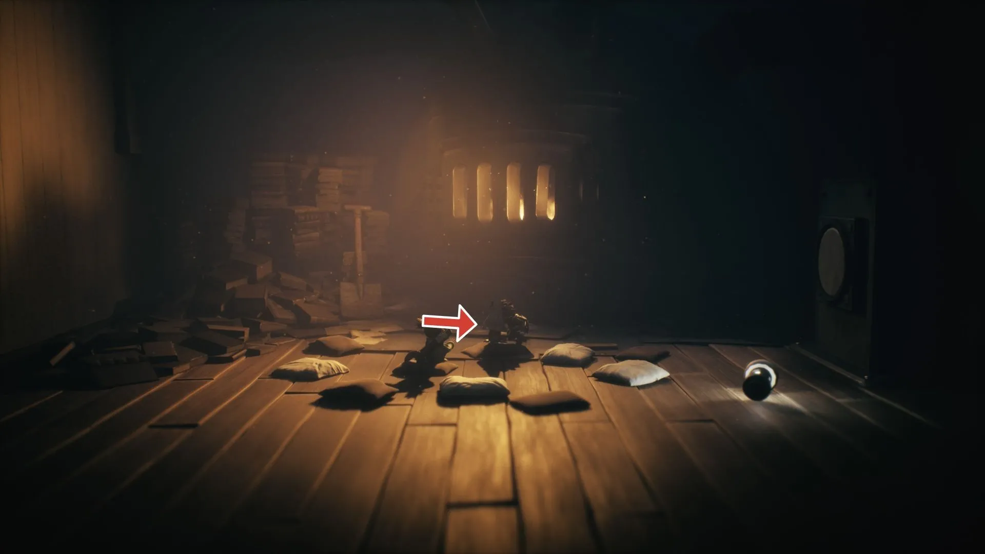 Nome đầu tiên đứng cuối hành lang, bật lò để lộ Nome trong Chương 3 Little Nightmares 3
