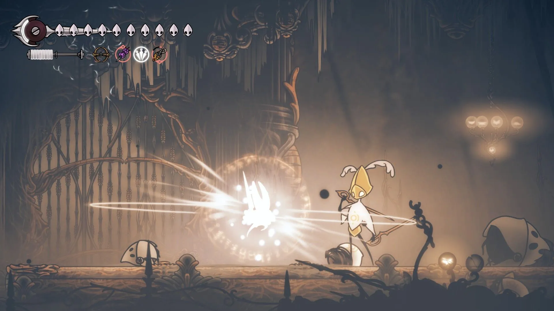 Sử dụng Injector Band để hồi máu trong Hollow Knight: Silksong, cảnh gameplay thể hiện chiều sâu cơ chế chiến đấu và khám phá